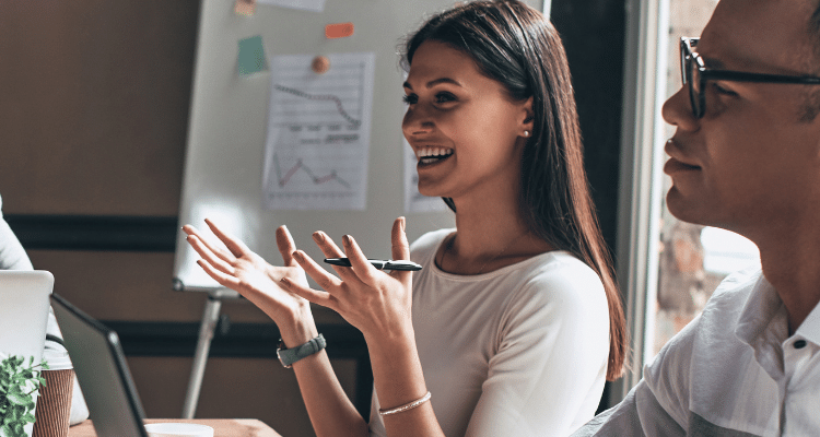Two business people around a table